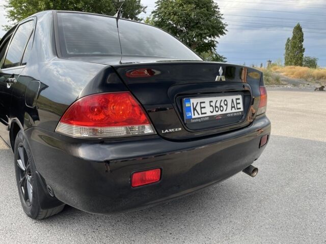 Чорний Міцубісі Lancer, об'ємом двигуна 1.6 л та пробігом 260 тис. км за 4600 $, фото 6 на Automoto.ua