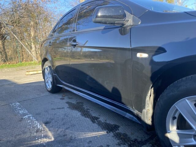 Черный Мицубиси Лансер, объемом двигателя 2 л и пробегом 372 тыс. км за 6200 $, фото 8 на Automoto.ua