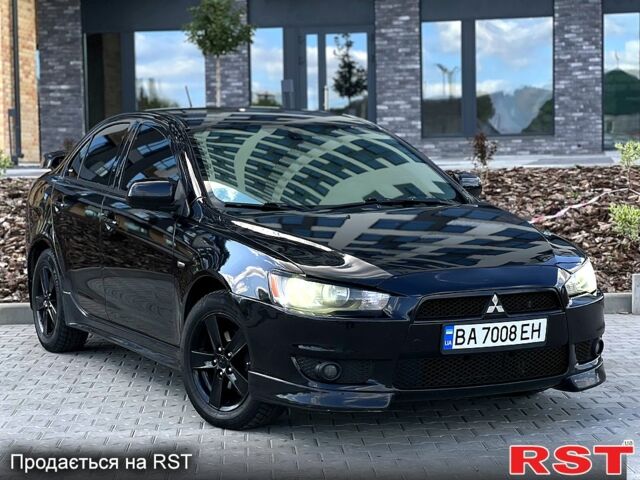 Чорний Міцубісі Lancer, об'ємом двигуна 2 л та пробігом 205 тис. км за 6500 $, фото 5 на Automoto.ua