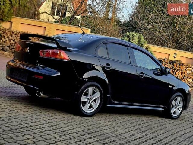 Чорний Міцубісі Lancer, об'ємом двигуна 2 л та пробігом 260 тис. км за 6555 $, фото 10 на Automoto.ua