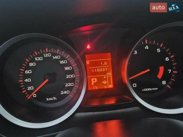 Черный Мицубиси Лансер, объемом двигателя 2 л и пробегом 116 тыс. км за 7200 $, фото 8 на Automoto.ua
