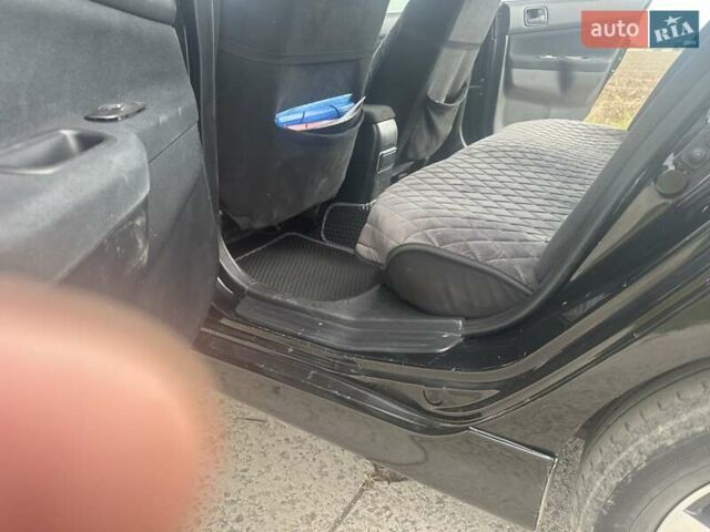 Чорний Міцубісі Lancer, об'ємом двигуна 1.6 л та пробігом 310 тис. км за 5100 $, фото 6 на Automoto.ua