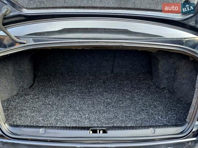 Черный Мицубиси Лансер, объемом двигателя 2 л и пробегом 260 тыс. км за 6555 $, фото 43 на Automoto.ua