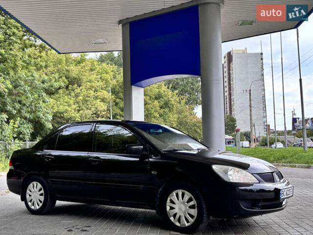 Чорний Міцубісі Lancer, об'ємом двигуна 1.6 л та пробігом 173 тис. км за 3700 $, фото 5 на Automoto.ua