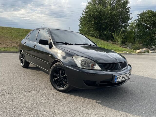 Чорний Міцубісі Lancer, об'ємом двигуна 1.6 л та пробігом 260 тис. км за 4600 $, фото 2 на Automoto.ua