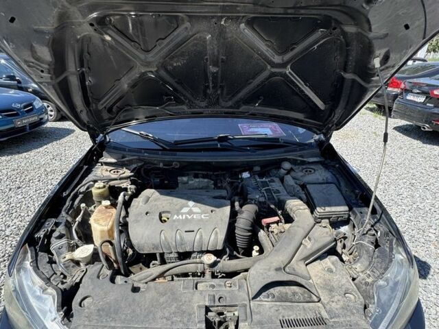 Чорний Міцубісі Lancer, об'ємом двигуна 2 л та пробігом 253 тис. км за 6400 $, фото 7 на Automoto.ua