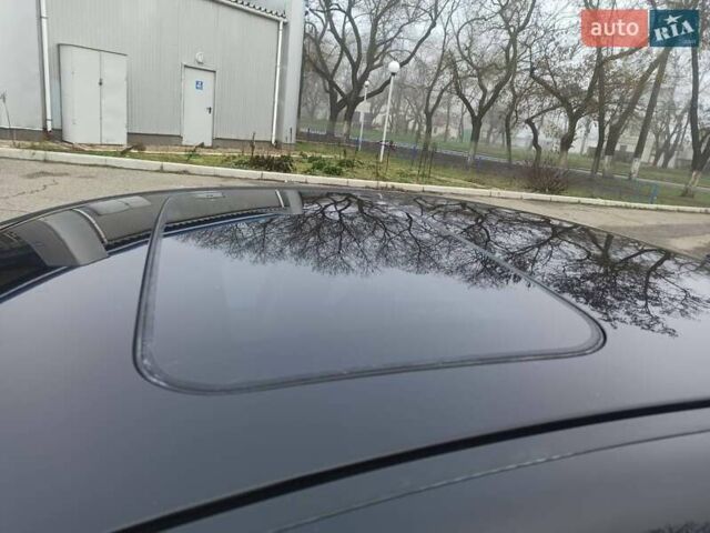 Черный Мицубиси Лансер, объемом двигателя 2 л и пробегом 195 тыс. км за 7899 $, фото 29 на Automoto.ua