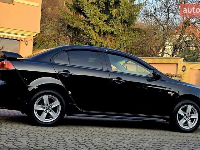Чорний Міцубісі Lancer, об'ємом двигуна 2 л та пробігом 260 тис. км за 6555 $, фото 17 на Automoto.ua