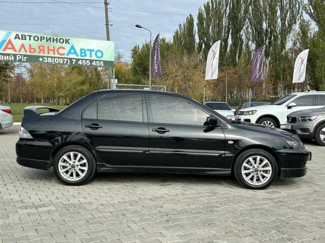 Мицубиси Лансер 2007 в Кривом Роге на Automoto.ua Черный Мицубиси Лансер, объемом двигателя 2 л и пробегом 143 тыс. км за 5400 $, фото 6 на Automoto.ua