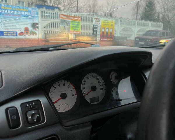 Черный Мицубиси Лансер, объемом двигателя 1.6 л и пробегом 180 тыс. км за 3499 $, фото 19 на Automoto.ua