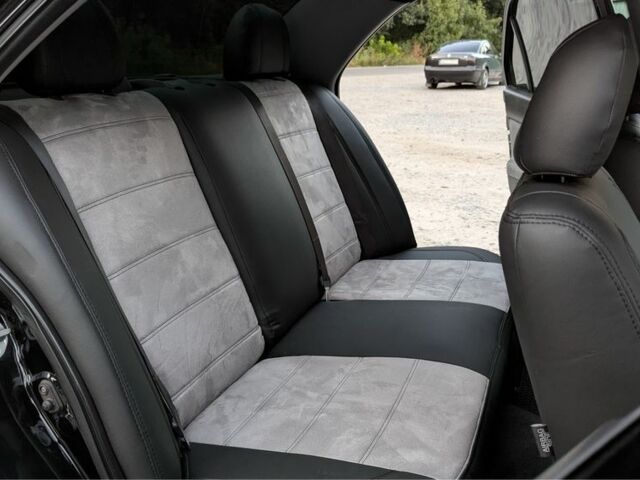 Черный Мицубиси Лансер, объемом двигателя 1.6 л и пробегом 226 тыс. км за 4800 $, фото 9 на Automoto.ua