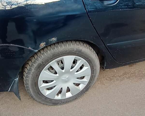Чорний Міцубісі Lancer, об'ємом двигуна 1.6 л та пробігом 296 тис. км за 4500 $, фото 6 на Automoto.ua