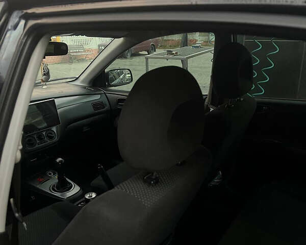 Черный Мицубиси Лансер, объемом двигателя 1.6 л и пробегом 180 тыс. км за 3499 $, фото 17 на Automoto.ua