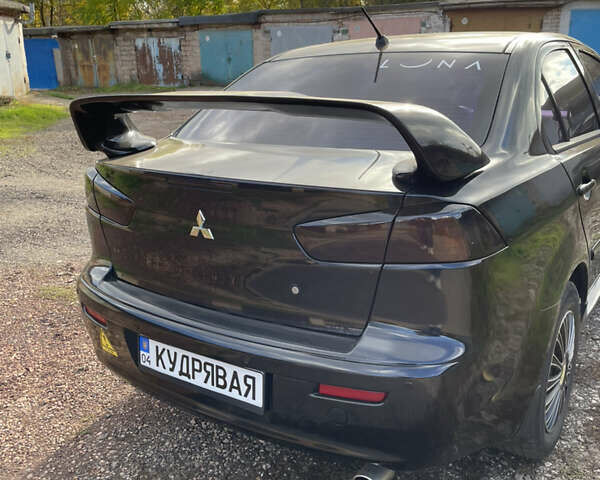 Чорний Міцубісі Lancer, об'ємом двигуна 1.5 л та пробігом 150 тис. км за 6500 $, фото 6 на Automoto.ua