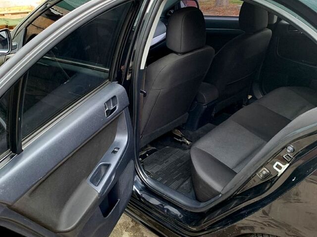 Мицубиси Лансер 2007 в Кобеляках на Automoto.ua Черный Мицубиси Лансер, объемом двигателя 1.8 л и пробегом 235 тыс. км за 6100 $, фото 3 на Automoto.ua