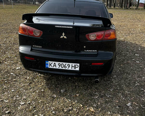 Чорний Міцубісі Lancer, об'ємом двигуна 2 л та пробігом 255 тис. км за 5000 $, фото 3 на Automoto.ua
