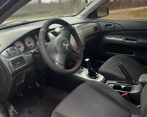 Черный Мицубиси Лансер, объемом двигателя 1.6 л и пробегом 272 тыс. км за 2800 $, фото 13 на Automoto.ua