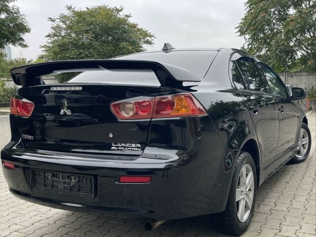 Чорний Міцубісі Lancer, об'ємом двигуна 2 л та пробігом 200 тис. км за 6800 $, фото 3 на Automoto.ua