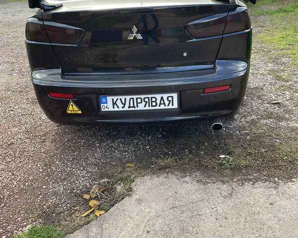 Чорний Міцубісі Lancer, об'ємом двигуна 1.5 л та пробігом 150 тис. км за 6500 $, фото 4 на Automoto.ua