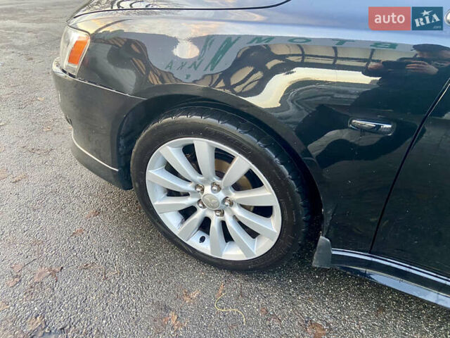 Чорний Міцубісі Lancer, об'ємом двигуна 2 л та пробігом 222 тис. км за 7500 $, фото 9 на Automoto.ua