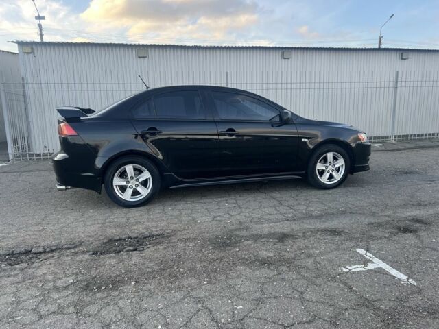 Черный Мицубиси Лансер, объемом двигателя 2 л и пробегом 170 тыс. км за 7900 $, фото 19 на Automoto.ua