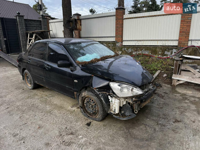 Черный Мицубиси Лансер, объемом двигателя 1.58 л и пробегом 160 тыс. км за 1299 $, фото 3 на Automoto.ua