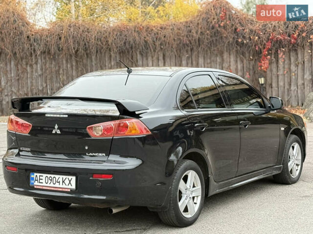 Чорний Міцубісі Lancer, об'ємом двигуна 2 л та пробігом 224 тис. км за 6500 $, фото 6 на Automoto.ua