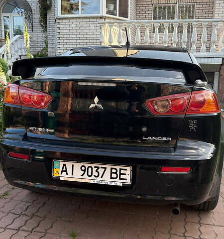 Черный Мицубиси Лансер, объемом двигателя 1.5 л и пробегом 111 тыс. км за 7500 $, фото 4 на Automoto.ua