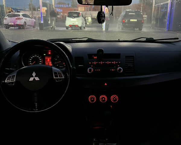 Мицубиси Лансер 2007 в Николаеве на Automoto.ua Черный Мицубиси Лансер, объемом двигателя 2 л и пробегом 282 тыс. км за 6500 $, фото 16 на Automoto.ua