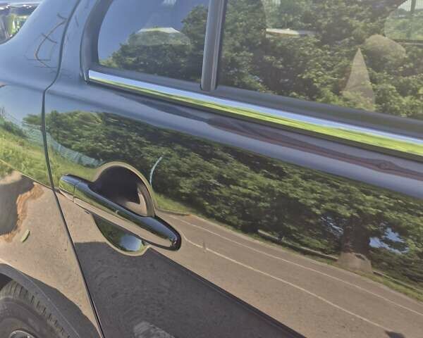 Чорний Міцубісі Lancer, об'ємом двигуна 2 л та пробігом 243 тис. км за 6600 $, фото 26 на Automoto.ua