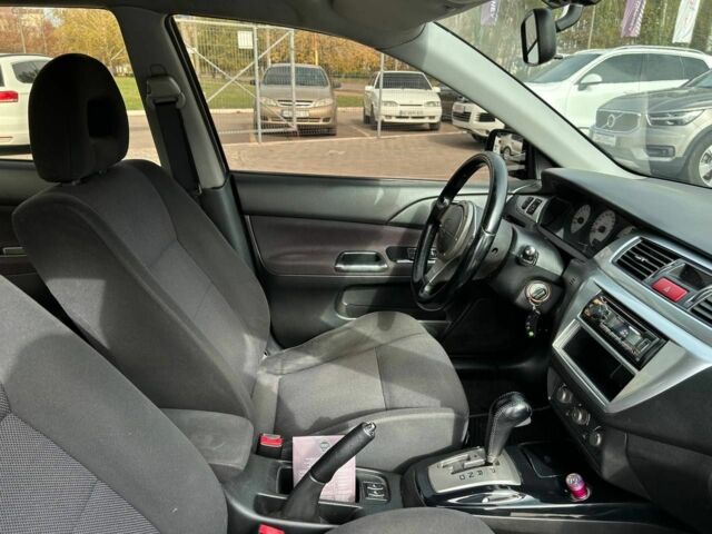 Мицубиси Лансер 2007 в Кривом Роге на Automoto.ua Черный Мицубиси Лансер, объемом двигателя 2 л и пробегом 143 тыс. км за 5400 $, фото 13 на Automoto.ua