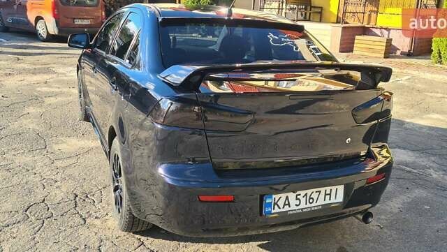 Мицубиси Лансер 2007 в Гостомель на Automoto.ua Черный Мицубиси Лансер, объемом двигателя 2 л и пробегом 258 тыс. км за 7200 $, фото 7 на Automoto.ua