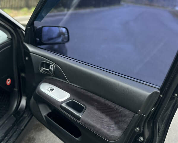 Черный Мицубиси Лансер, объемом двигателя 2 л и пробегом 260 тыс. км за 5300 $, фото 15 на Automoto.ua