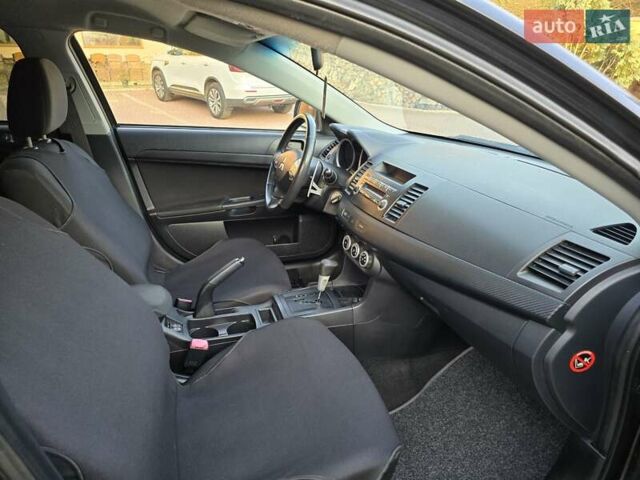 Чорний Міцубісі Lancer, об'ємом двигуна 2 л та пробігом 260 тис. км за 6555 $, фото 38 на Automoto.ua