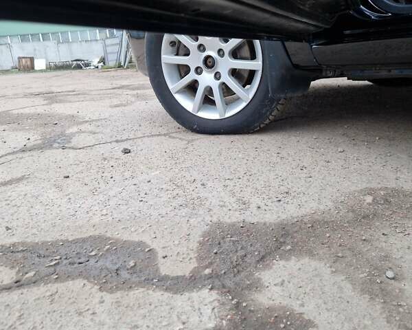 Чорний Міцубісі Lancer, об'ємом двигуна 1.6 л та пробігом 273 тис. км за 3999 $, фото 21 на Automoto.ua