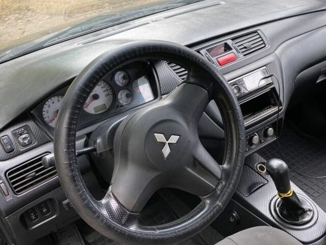 Чорний Міцубісі Lancer, об'ємом двигуна 1.6 л та пробігом 232 тис. км за 4200 $, фото 4 на Automoto.ua