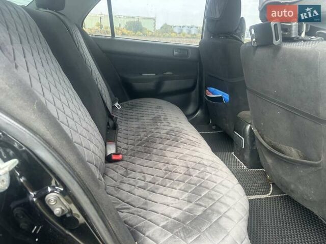 Чорний Міцубісі Lancer, об'ємом двигуна 1.6 л та пробігом 310 тис. км за 5100 $, фото 10 на Automoto.ua