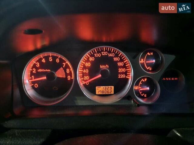 Чорний Міцубісі Lancer, об'ємом двигуна 1.59 л та пробігом 180 тис. км за 4999 $, фото 17 на Automoto.ua
