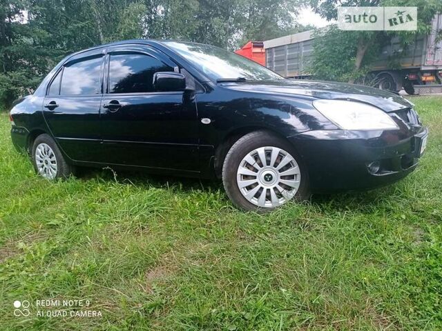 Чорний Міцубісі Lancer, об'ємом двигуна 1.58 л та пробігом 400 тис. км за 3700 $, фото 18 на Automoto.ua