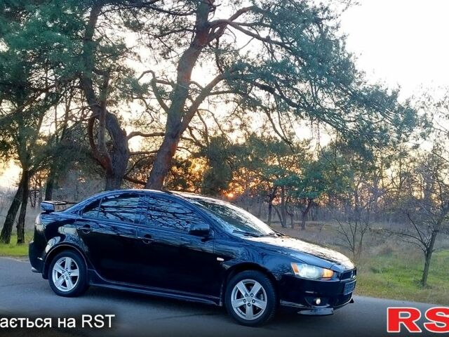 Чорний Міцубісі Lancer, об'ємом двигуна 2 л та пробігом 177 тис. км за 6999 $, фото 4 на Automoto.ua