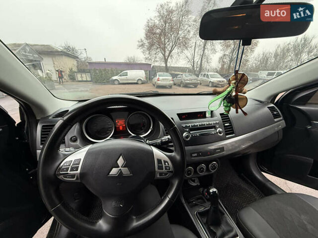 Чорний Міцубісі Lancer, об'ємом двигуна 2 л та пробігом 281 тис. км за 6000 $, фото 13 на Automoto.ua