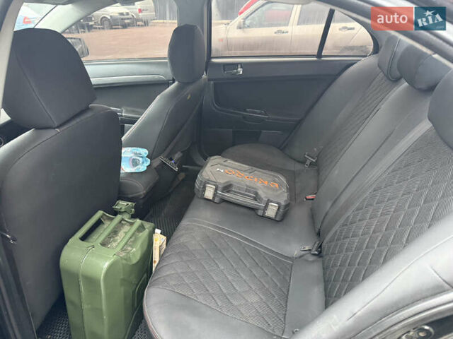 Чорний Міцубісі Lancer, об'ємом двигуна 2 л та пробігом 281 тис. км за 6000 $, фото 16 на Automoto.ua