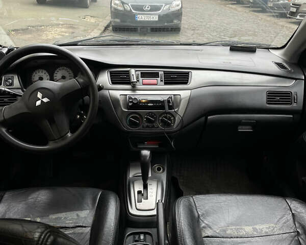 Чорний Міцубісі Lancer, об'ємом двигуна 1.6 л та пробігом 213 тис. км за 3000 $, фото 8 на Automoto.ua