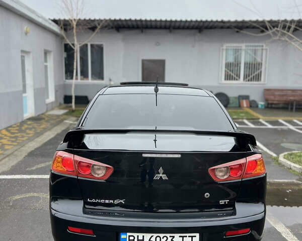 Чорний Міцубісі Lancer, об'ємом двигуна 2 л та пробігом 182 тис. км за 6999 $, фото 21 на Automoto.ua