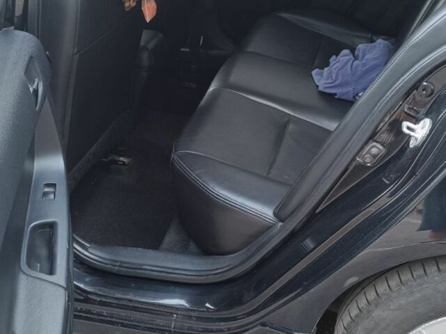 Черный Мицубиси Лансер, объемом двигателя 2 л и пробегом 210 тыс. км за 6000 $, фото 10 на Automoto.ua