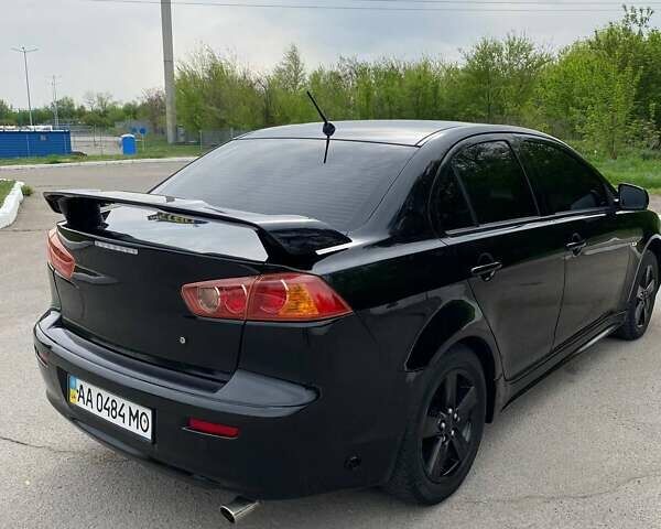 Чорний Міцубісі Lancer, об'ємом двигуна 2 л та пробігом 178 тис. км за 7000 $, фото 14 на Automoto.ua