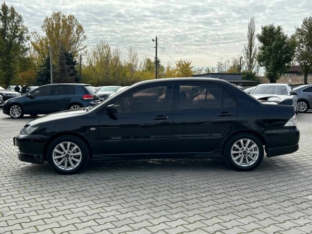 Мицубиси Лансер 2007 в Кривом Роге на Automoto.ua Черный Мицубиси Лансер, объемом двигателя 2 л и пробегом 143 тыс. км за 5400 $, фото 3 на Automoto.ua