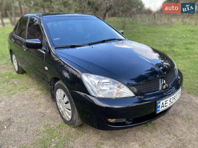 Чорний Міцубісі Lancer, об'ємом двигуна 1.6 л та пробігом 224 тис. км за 4950 $, фото 2 на Automoto.ua