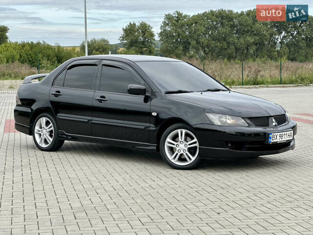 Чорний Міцубісі Lancer, об'ємом двигуна 2 л та пробігом 275 тис. км за 5300 $, фото 3 на Automoto.ua