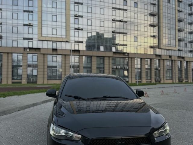 Черный Мицубиси Лансер, объемом двигателя 2 л и пробегом 242 тыс. км за 6200 $, фото 3 на Automoto.ua